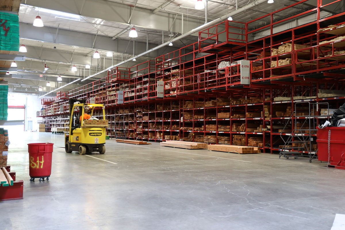 Forklift driving through indoor lumberyard at GSL Concord