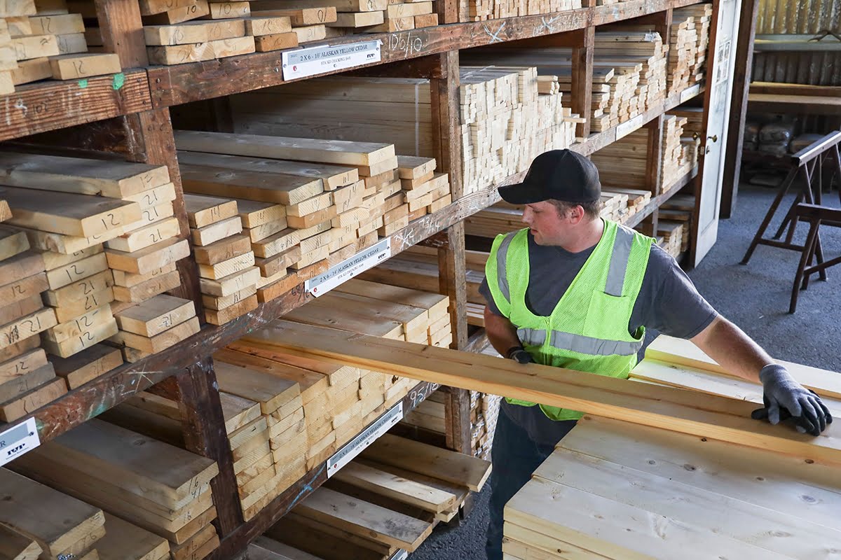 Staff stocking lumber at GSL San Rafael