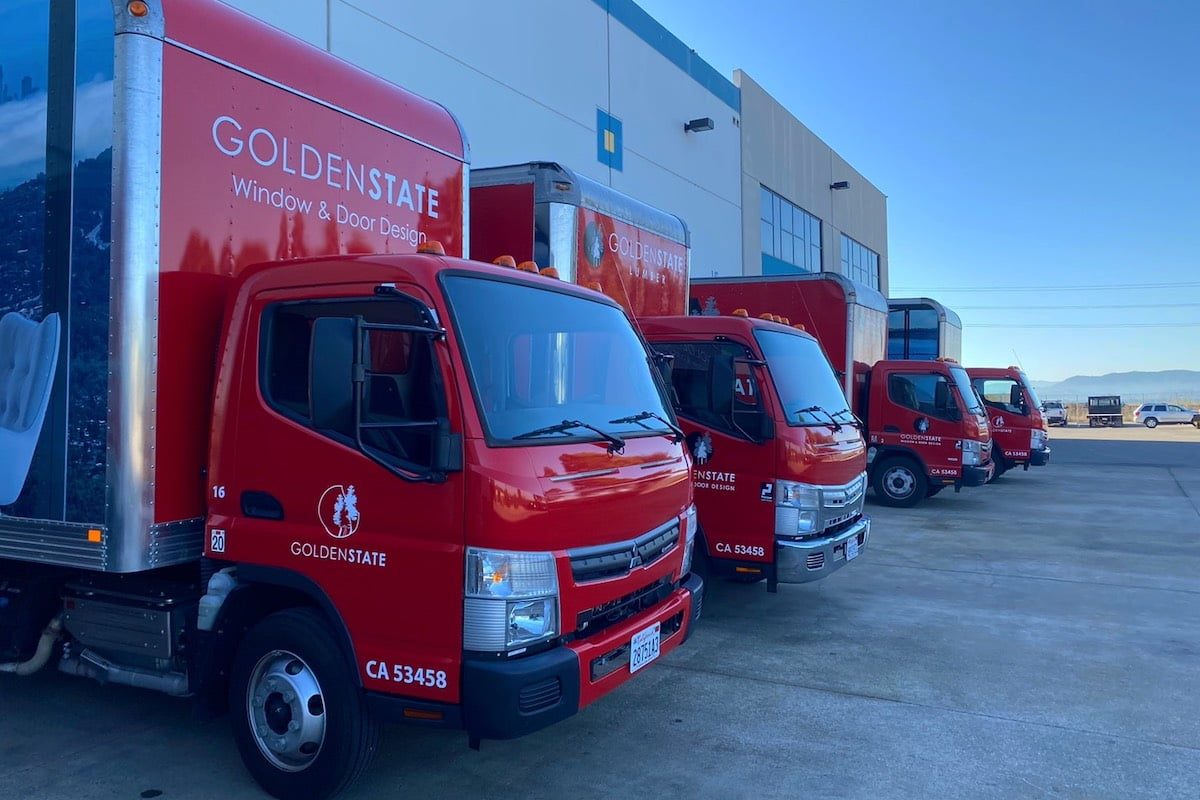 Red delivery trucks at Golden State Richmond