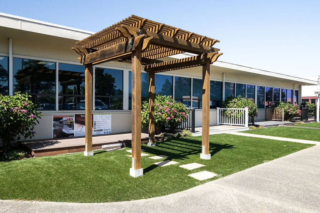 A pergola on display outside of the Golden State Lumber Newark showroom entrance
