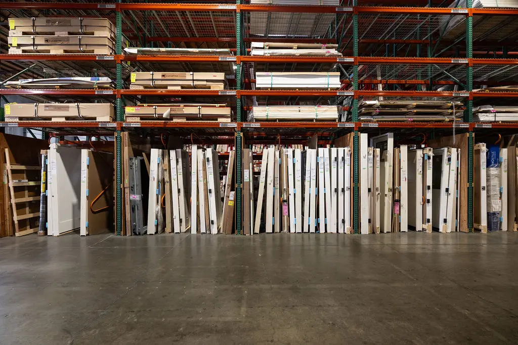 Large stocking shelves at the Golden State Richmond custom door shop