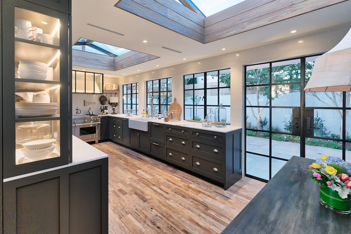 Modern farmhouse kitchen with glass french doors