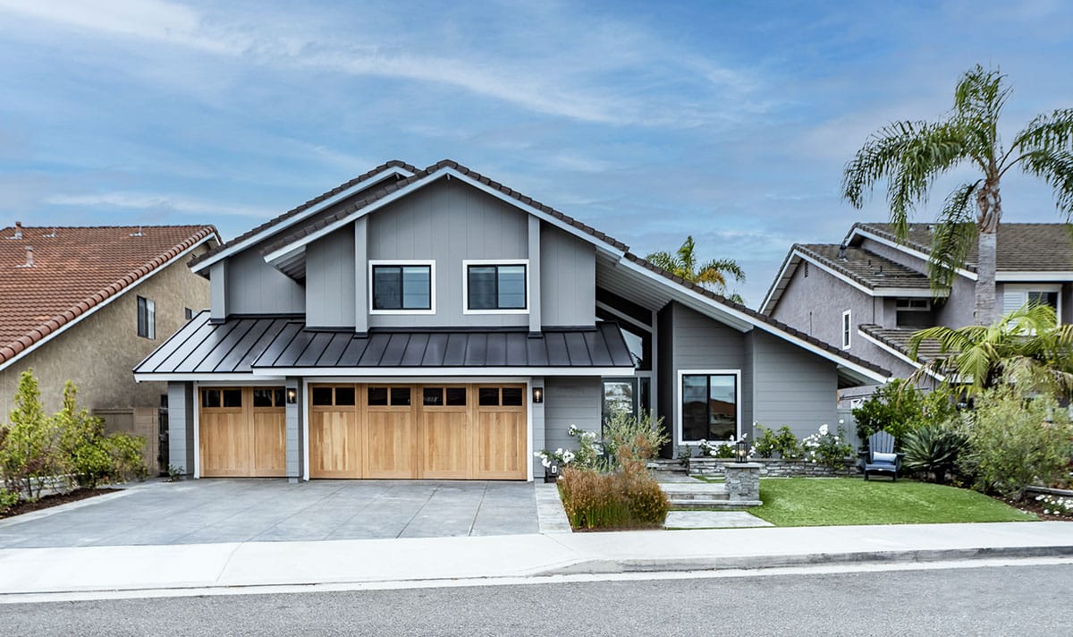 James Hardie two-story residential home with a wooden garage door