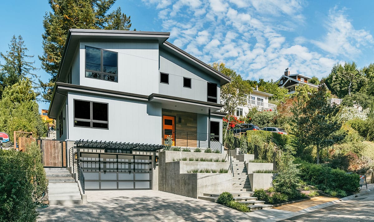 James Hardie two-story home with an orange door