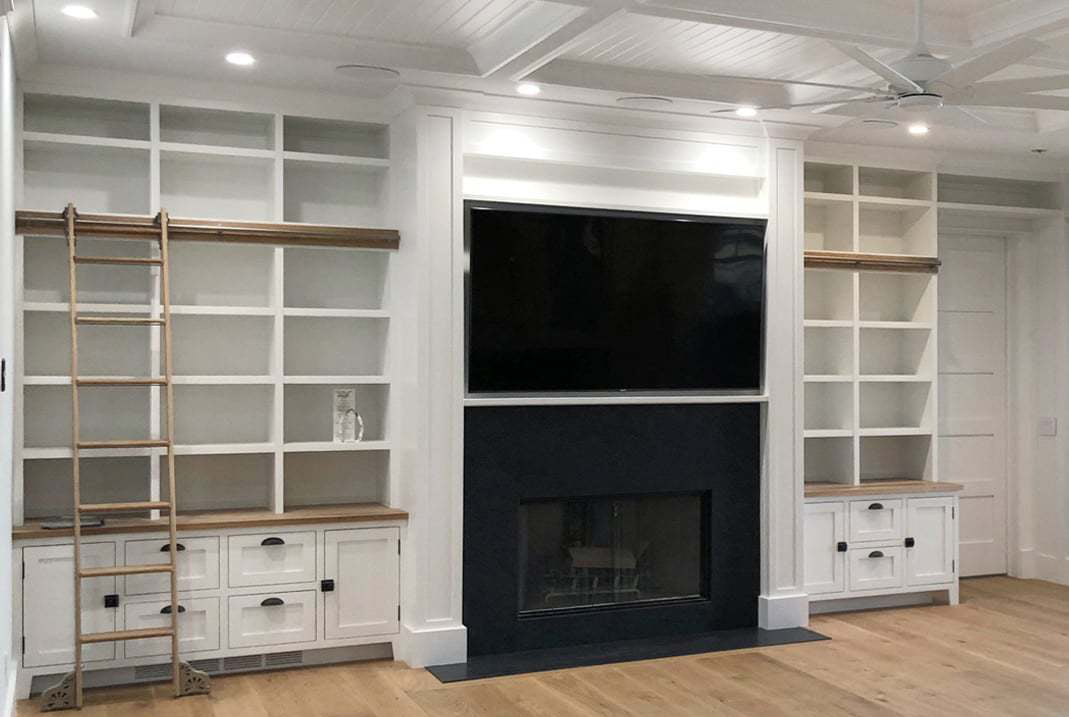 Wall storage around mantel with WindsorONE Interior Moulding and Trim