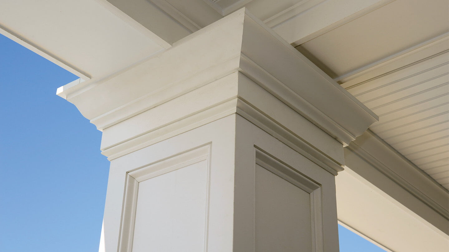 Closeup of Azek moulding on white columns