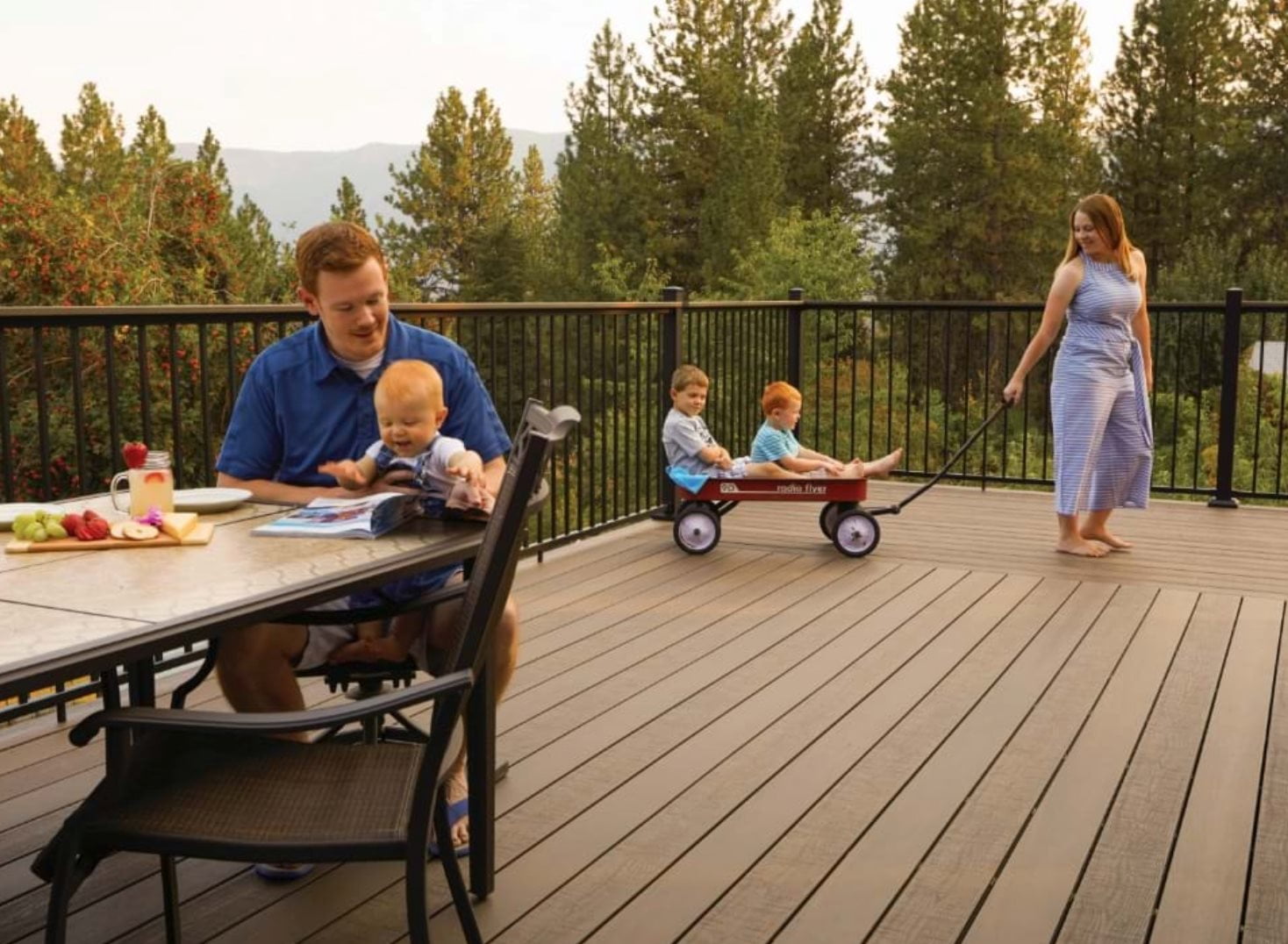 family playing on Fortress deck