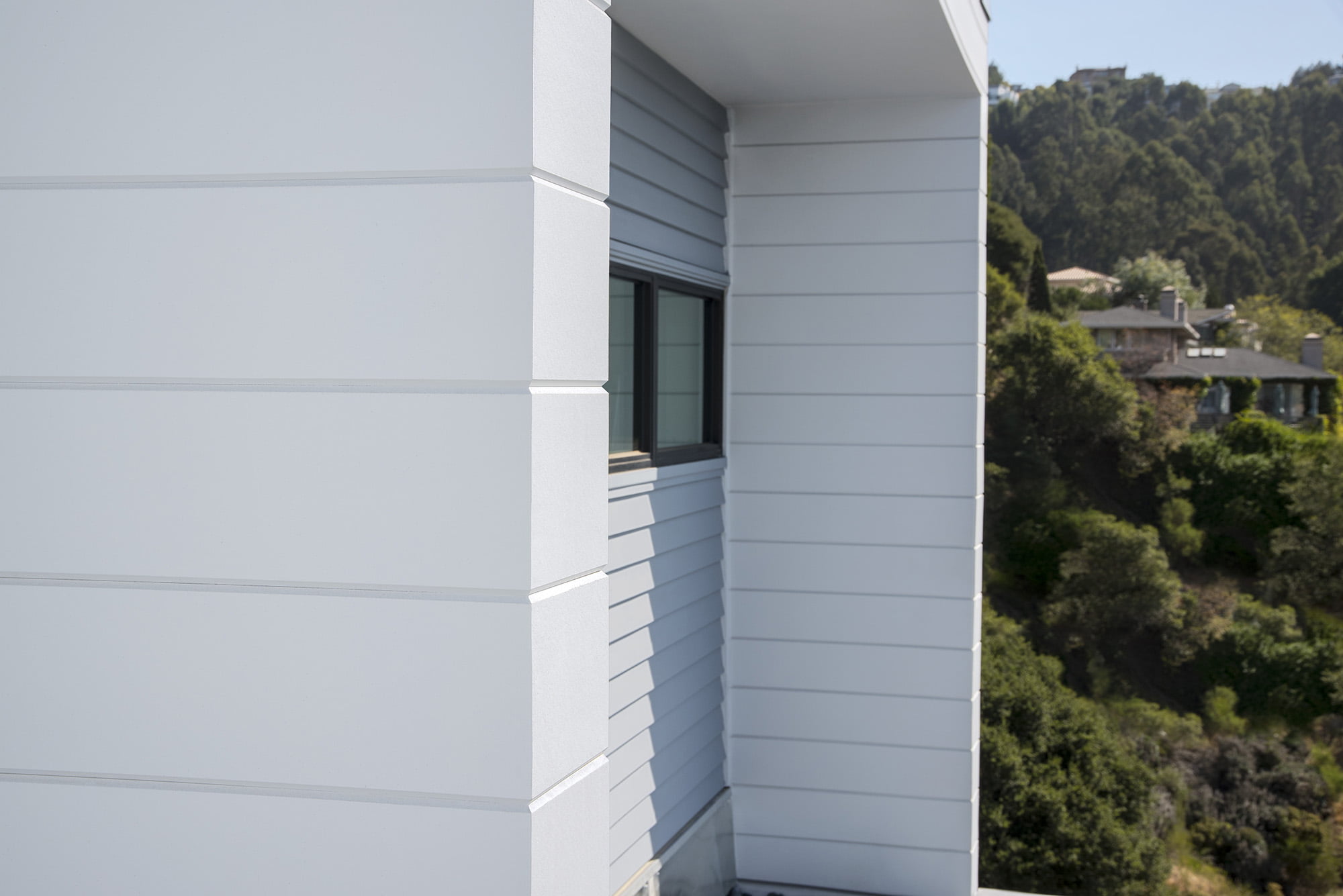 Closeup of James Hardie siding in light gray