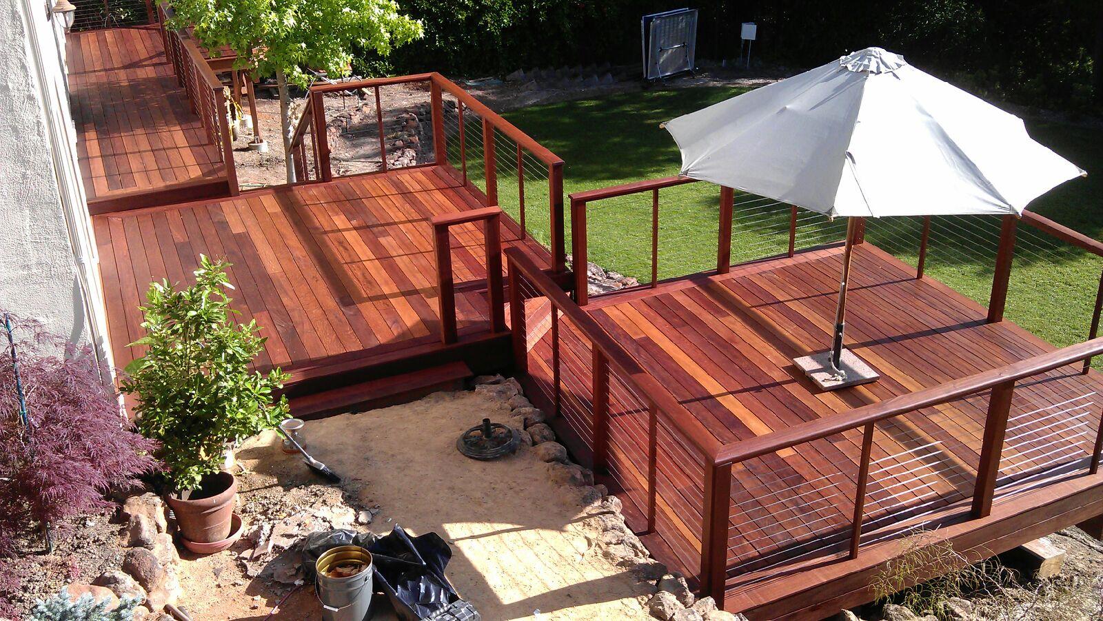 Aerial view of backyard with umbrella and Pau Lope decking