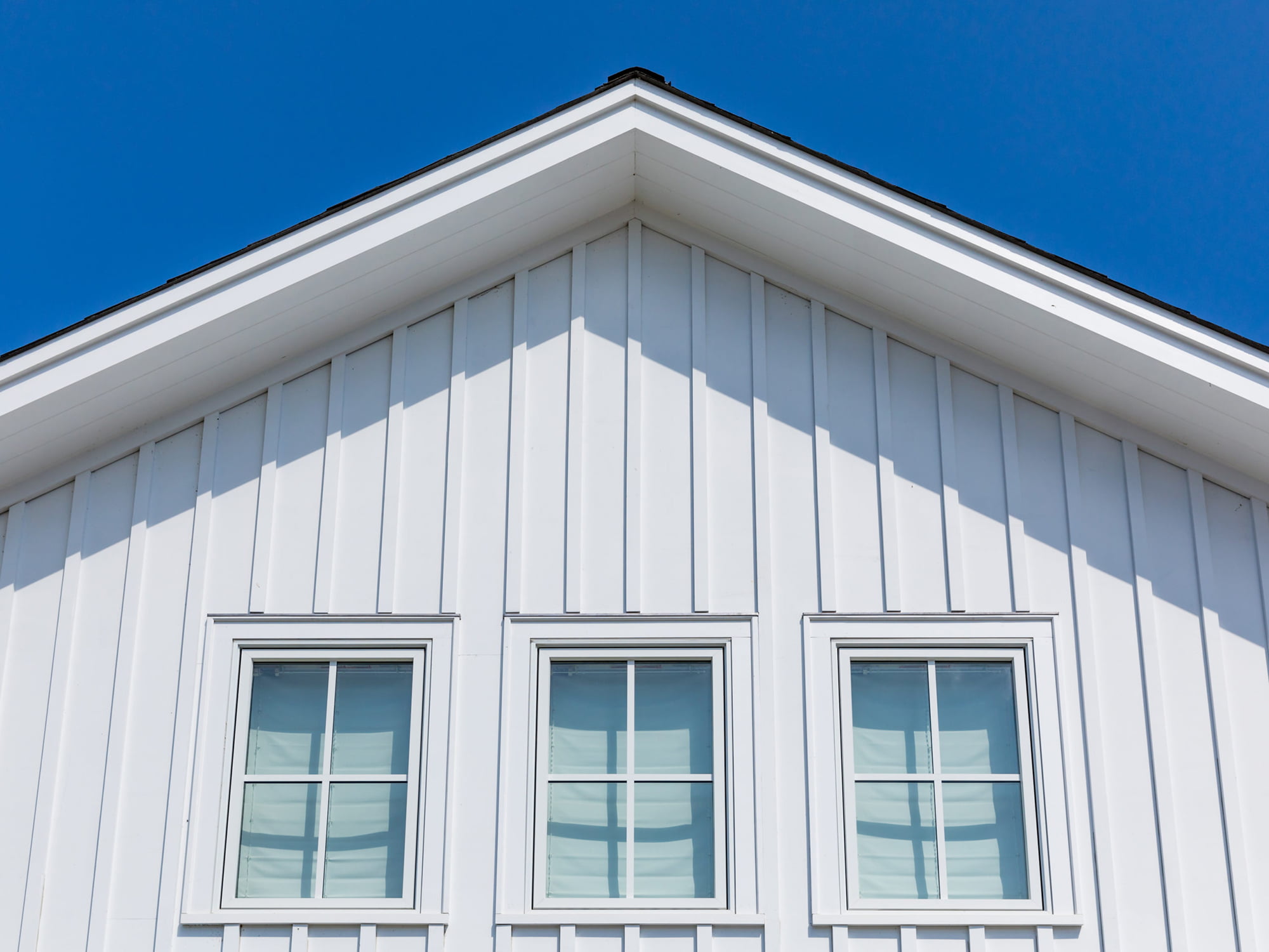 Tru Exterior white vertical siding closeup