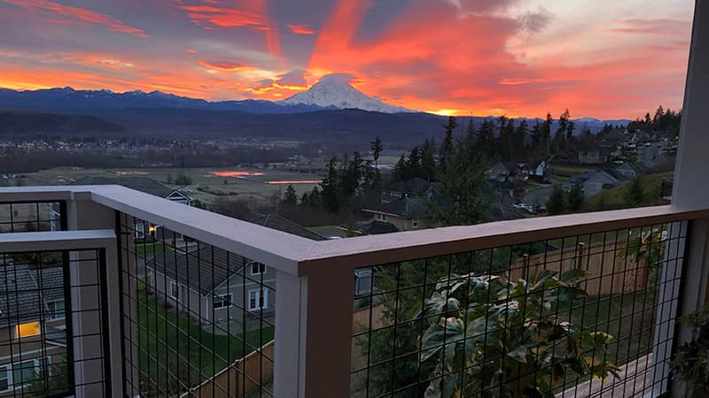 wild hog panels deck mountain view at sunset