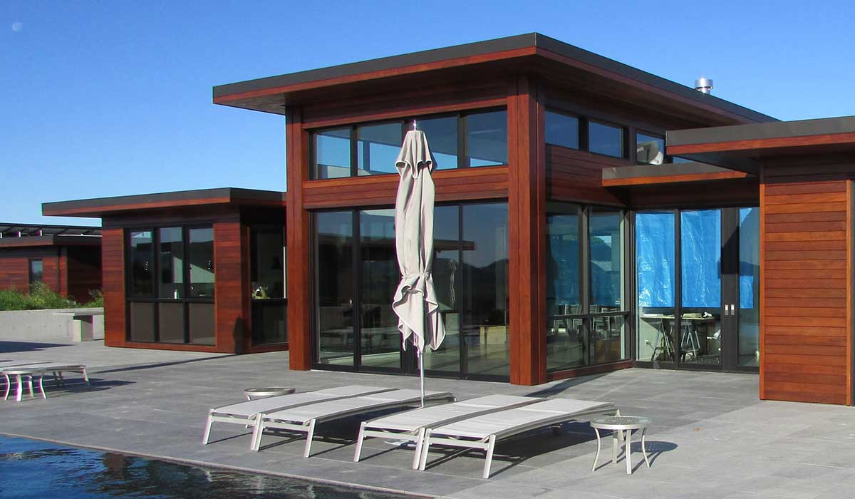 Climate-Shield Ipe rainscreen siding in dark cherry