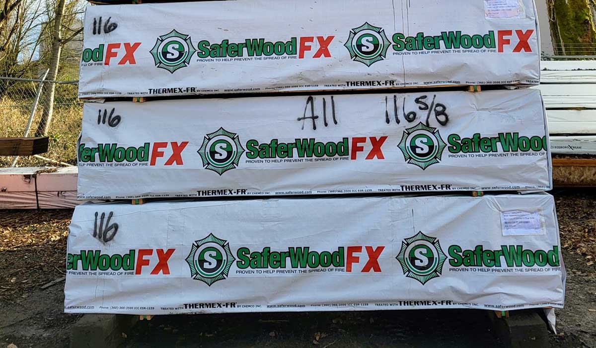 Stacks of wrapped Mataverde SaferWood lumber