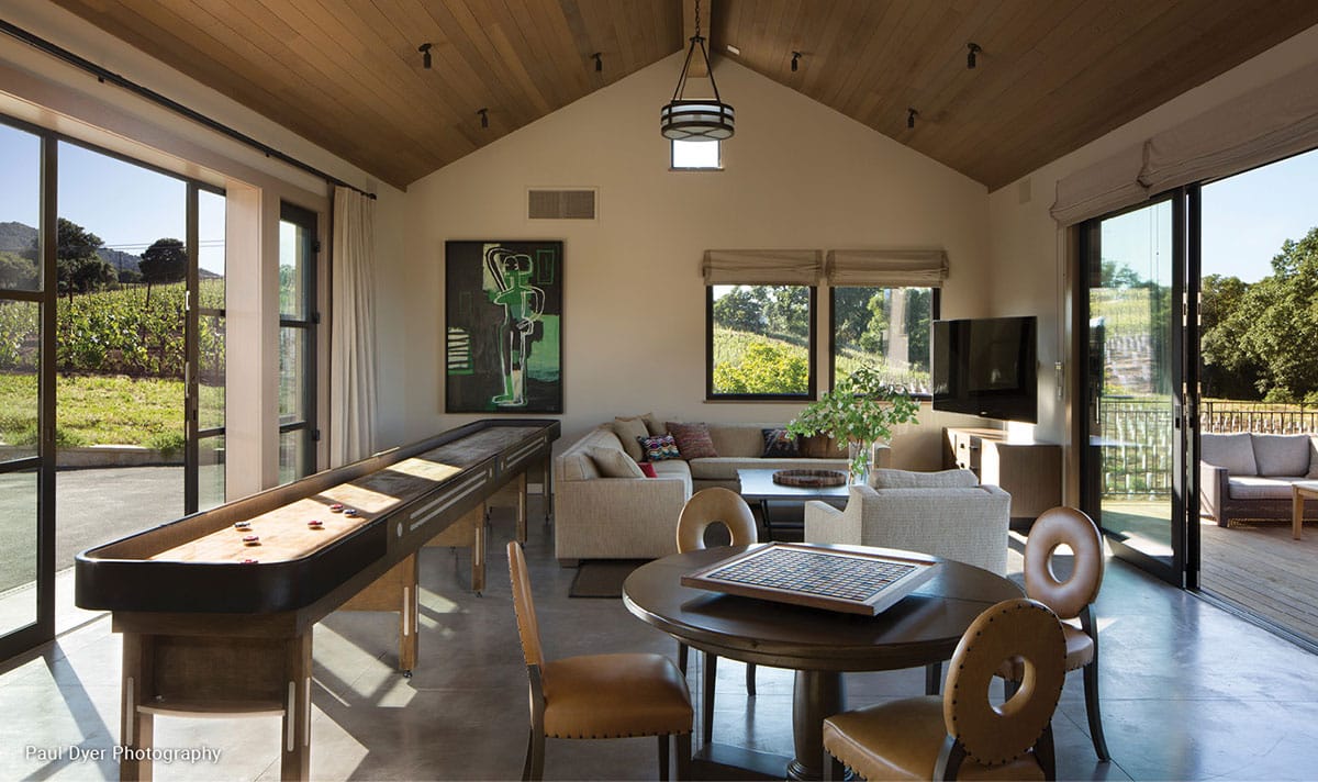 Sliding Fleetwood Windows and Doors on either side of a living space game room