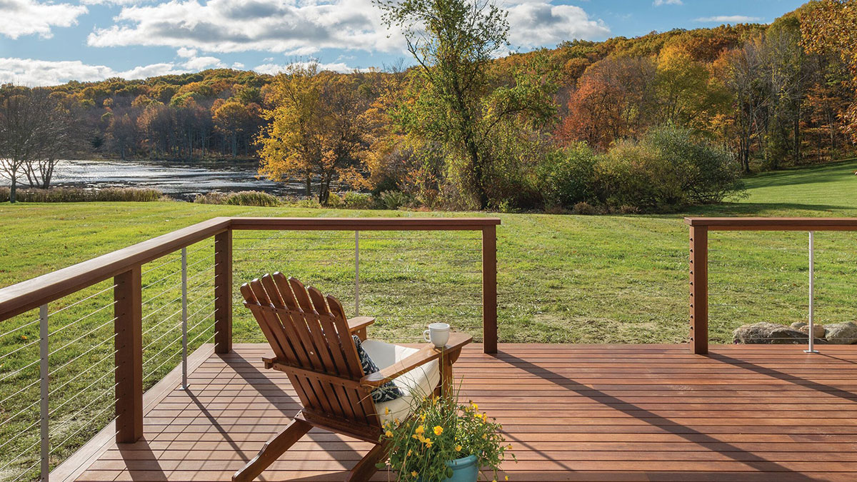 Feeney CableRail with wood frame on a lakeside deck