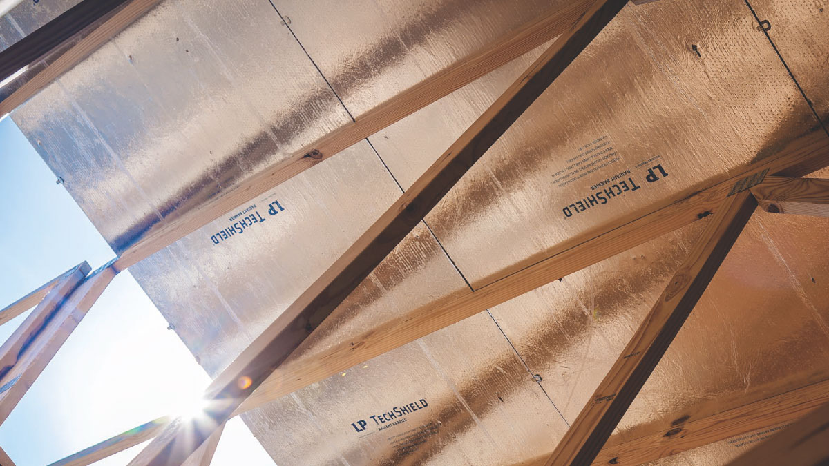 LP TechShield Radiant Barrier construction project on residential home with sun coming through