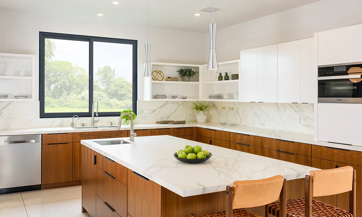 Milgard C700 Fiberglass windows in modern kitchen with wood island and stools. Credit ©John Muggenborg.