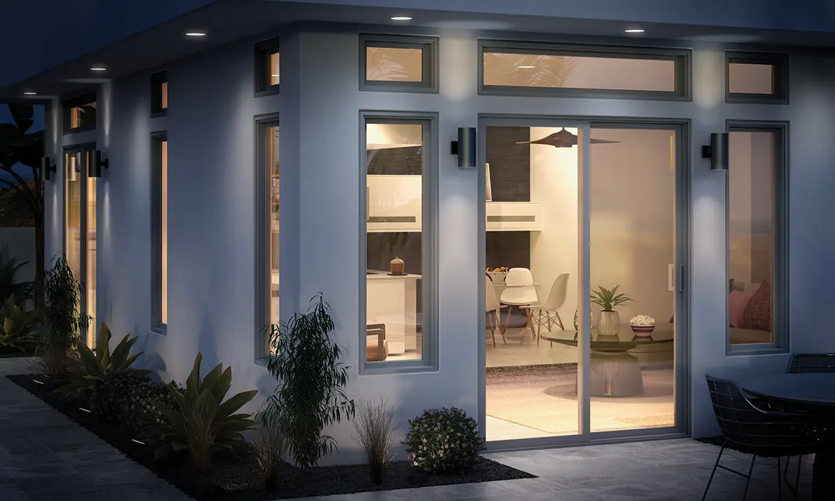 Backyard view of a home with Milgard Trinsic Exterior Vinyl windows and doors in black