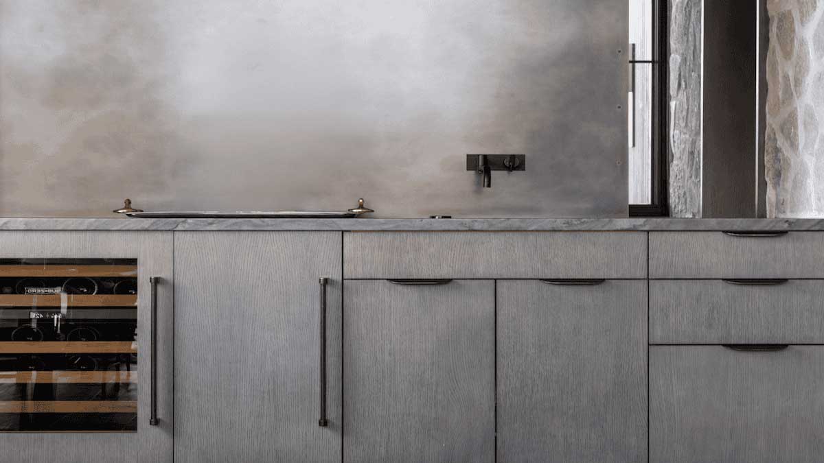 Rocky Mountain Hardware on wet bar with wine fridge