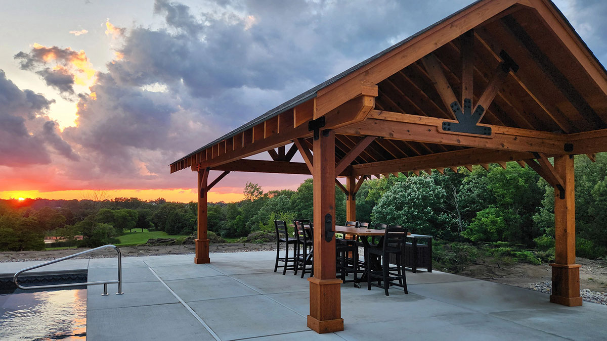Simpson Strong-Tie Outdoor Accents Avant Collection on a pool pavilion at sunset