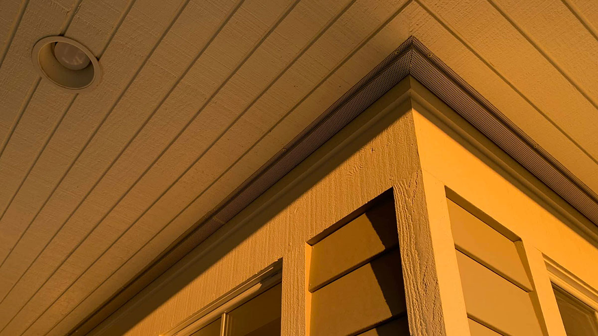 Underawning view of Vulcan Vent continuous vent around the corner of a home