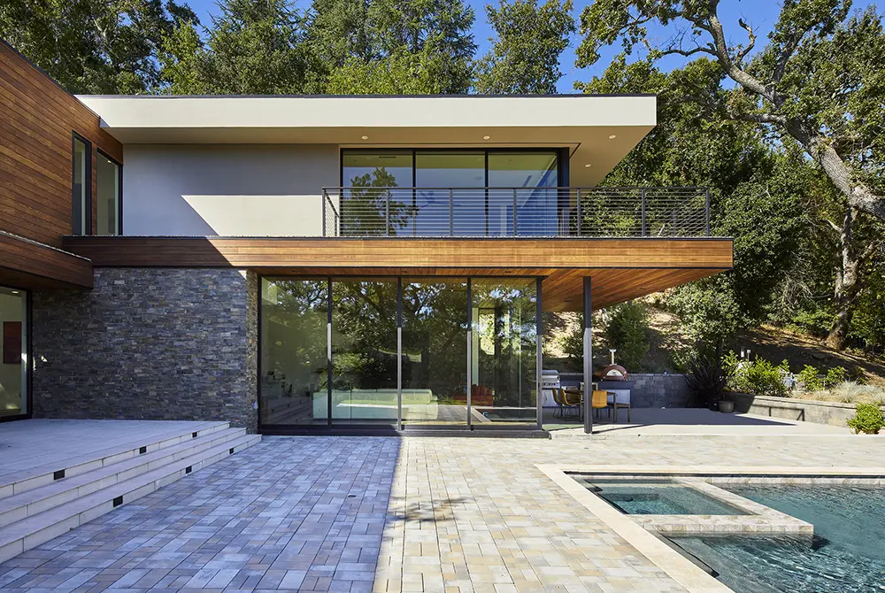 View of a two-story Lafayette home patio deck with pool