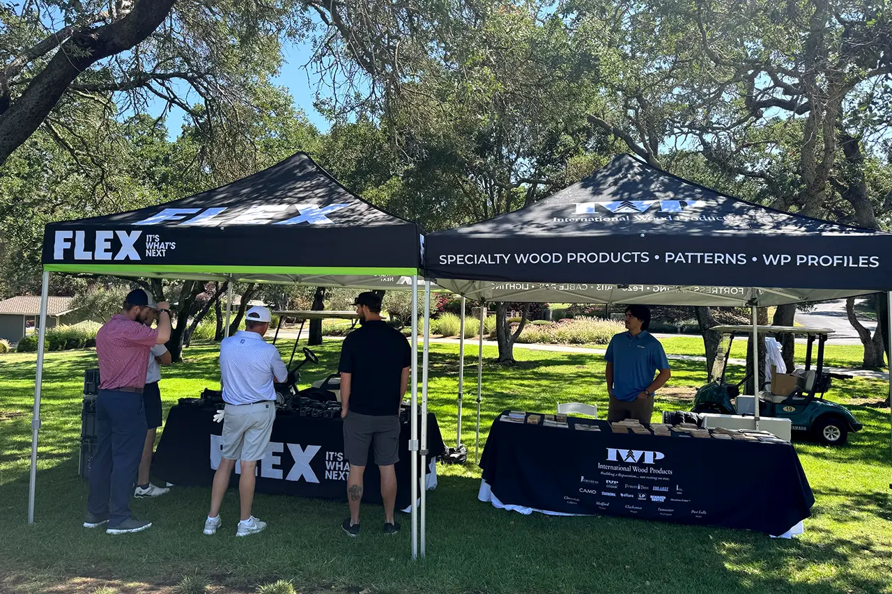 International Wood Products and Flex partner booths at the golf tournament