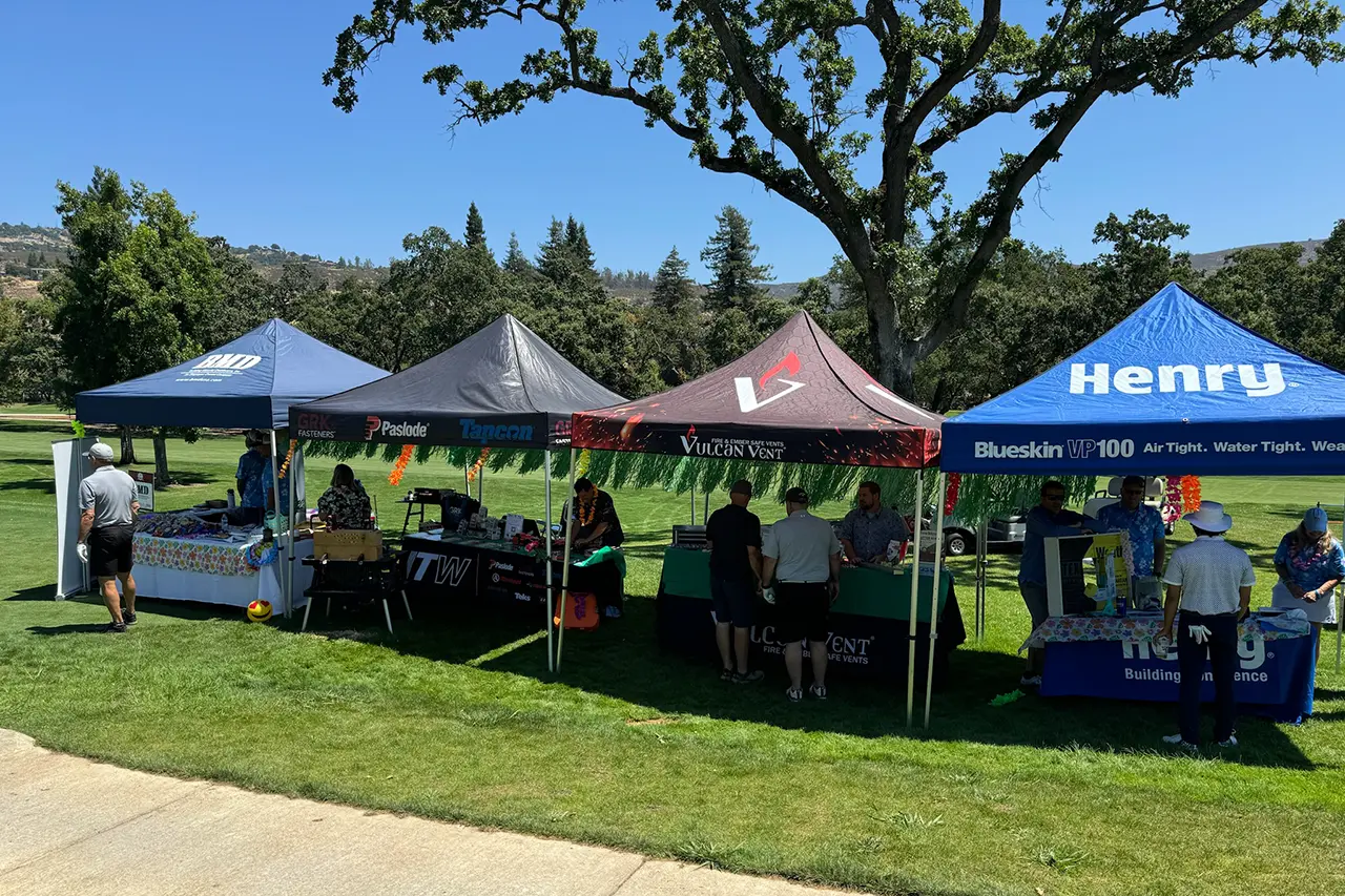 Partner booths at the annual Golden State Golf Tournament